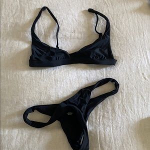 Black cheeky bathing suit. Black Hybrid Ark Swim